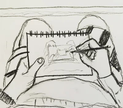 Artist sketching at the beach