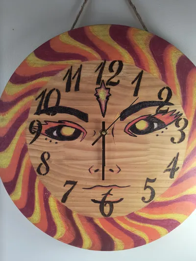 Sun face clock